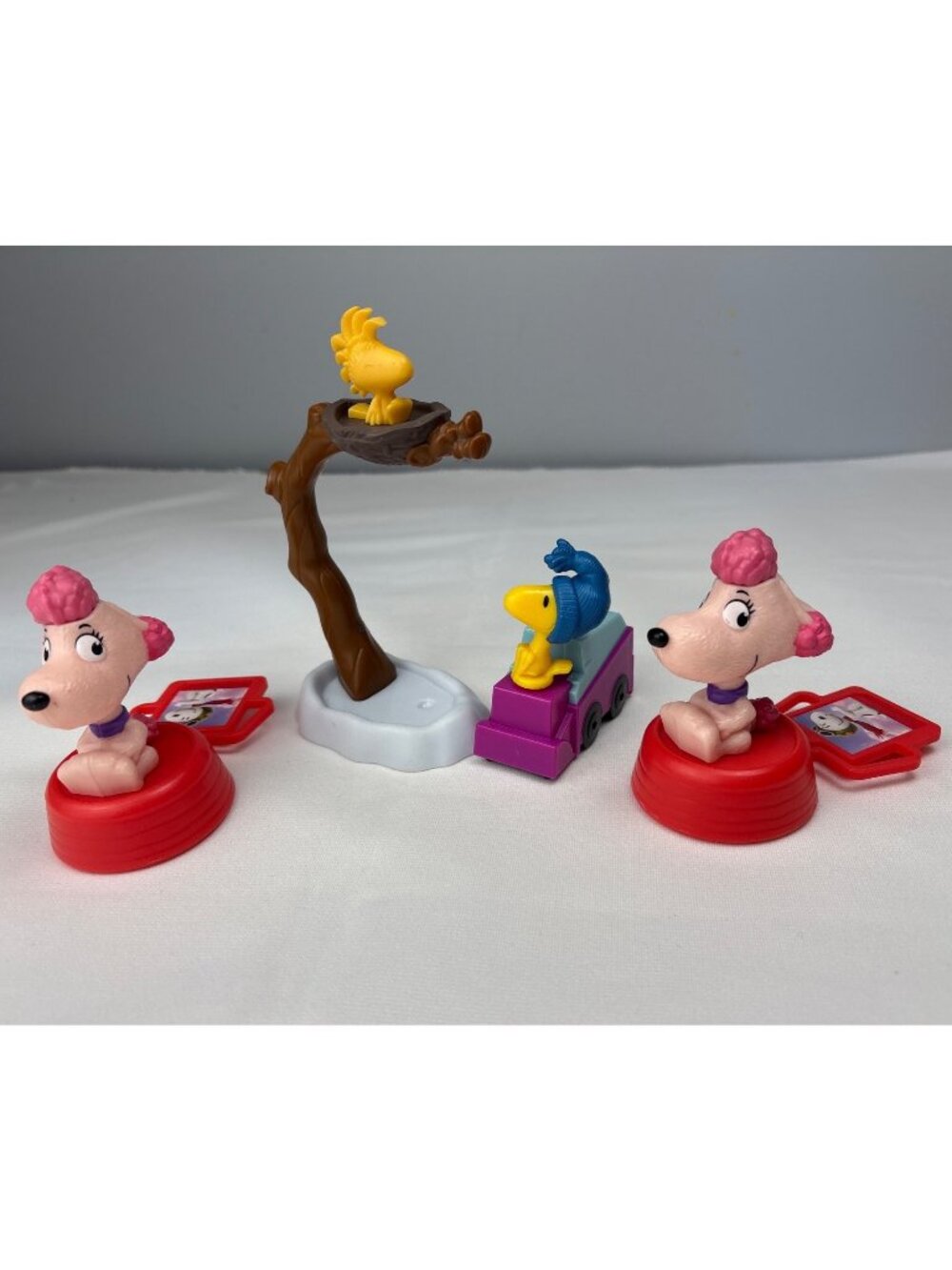 Peanuts Woodstock Fifi McDonalds 2015 Toy Set Collectibles Rolling Display
